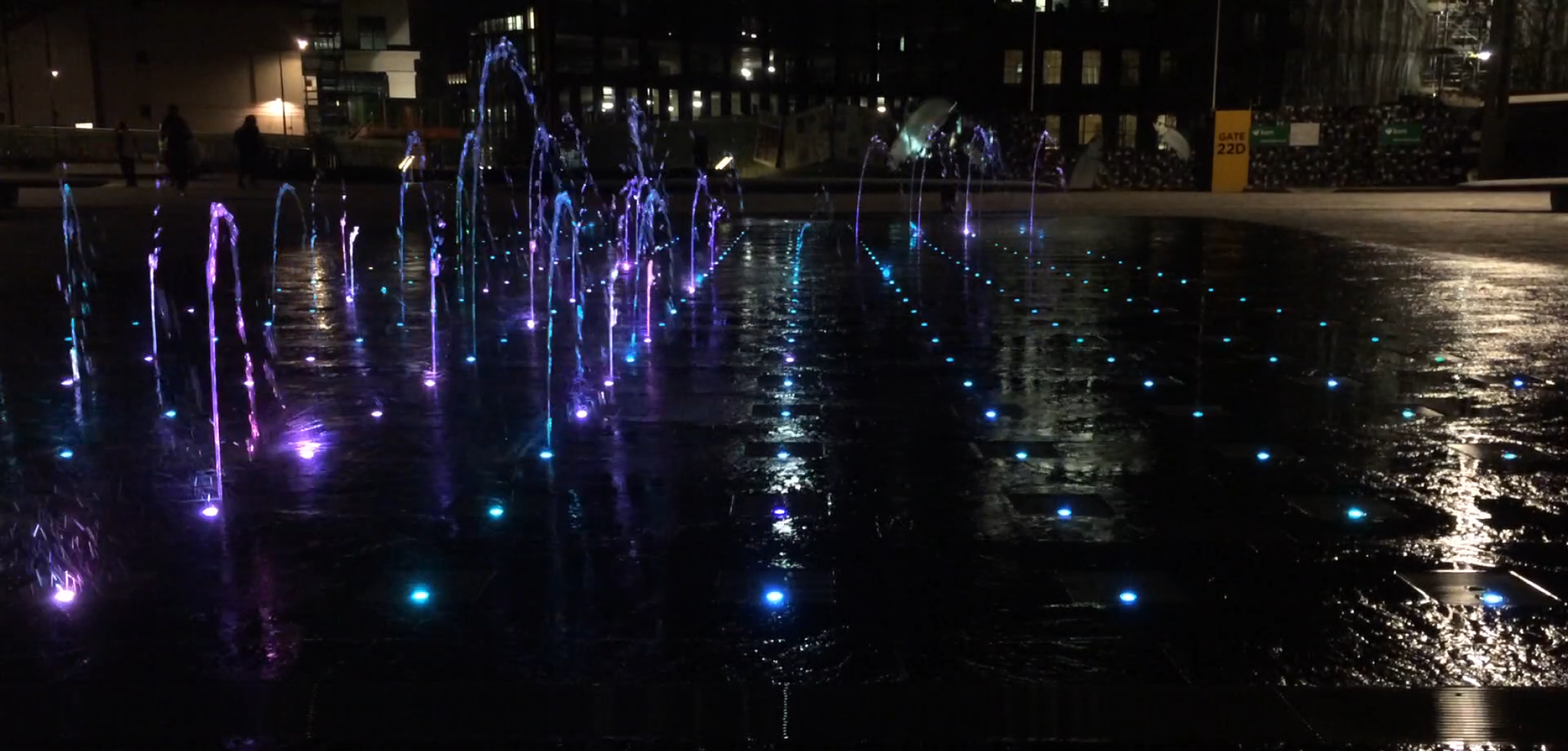 A photo of a fountain with lights